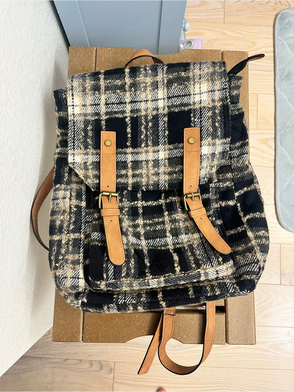 Natural Reflections black and beige plaid backpack